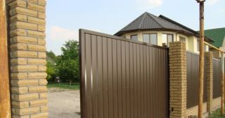 Купить откатные ворота из профнастила Северск, цена от 1755 руб.